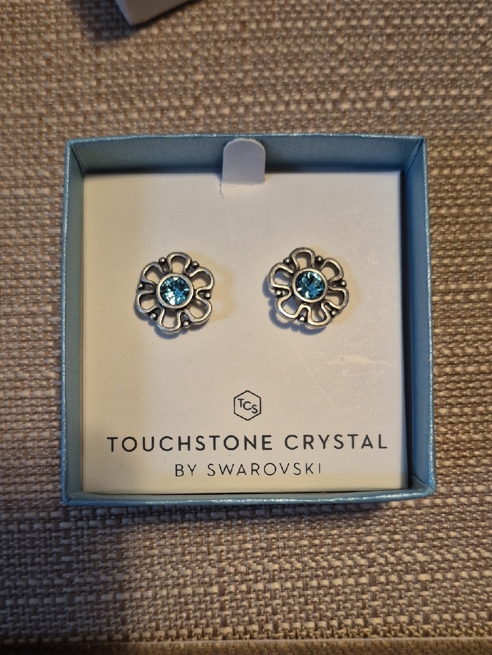 Touchstone Crystal Floral Stud Earrings with Blue Crystals